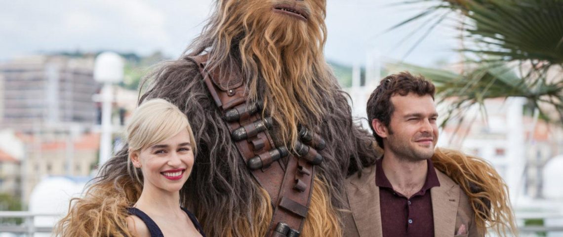 emilia clarke posing with Chewbacca