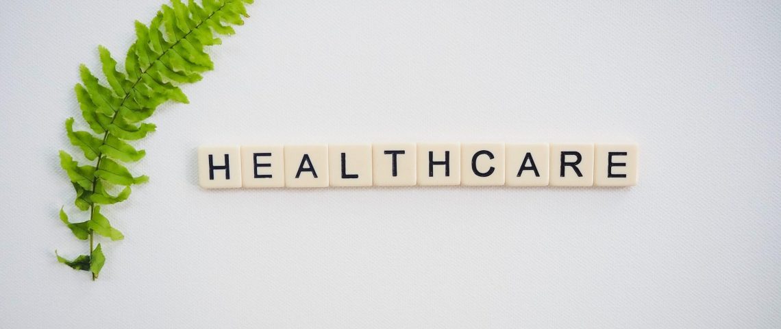 scrabble tiles spelling out the word healthcare