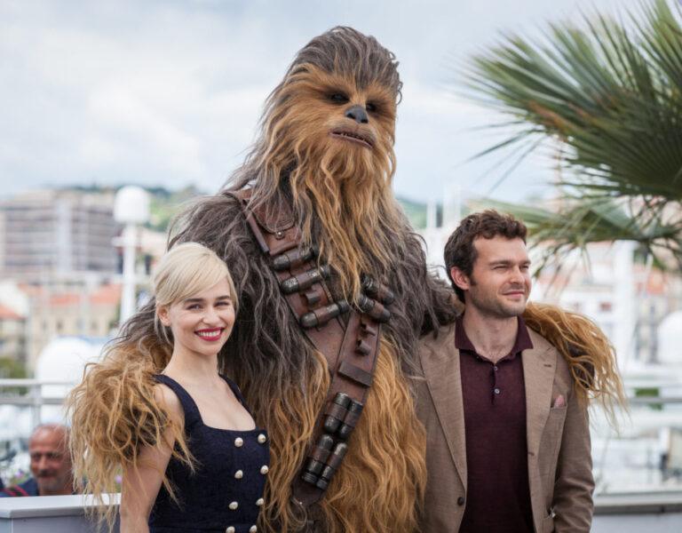 emilia clarke posing with Chewbacca